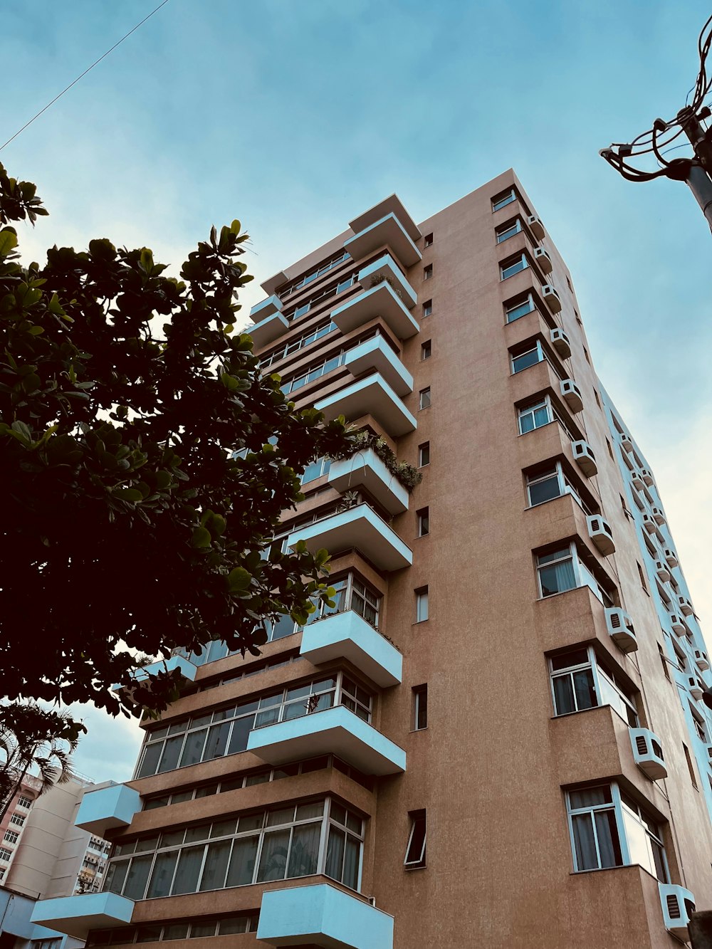 a tall building with balconies and balconies on it