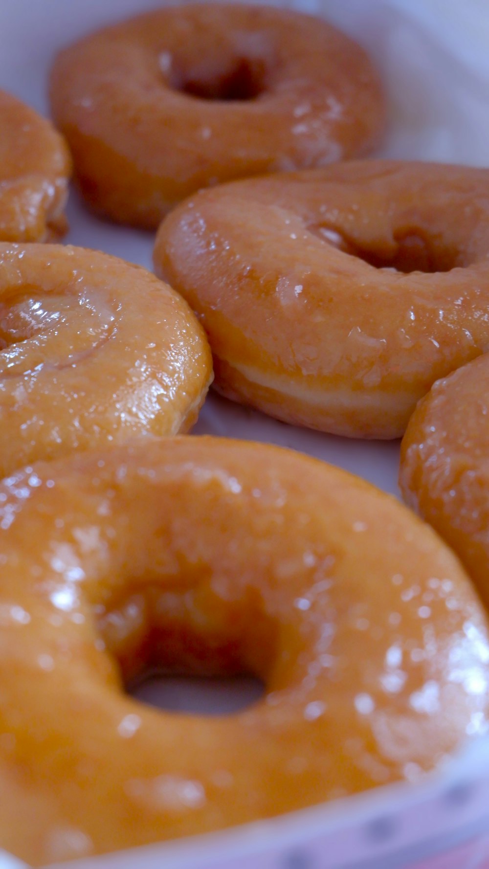 a close up of a box of doughnuts