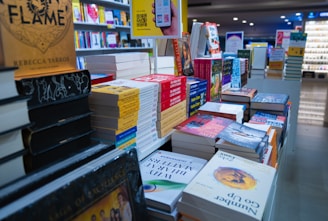 a store filled with lots of books on top of shelves