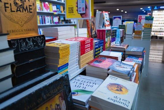 a store filled with lots of books on top of shelves