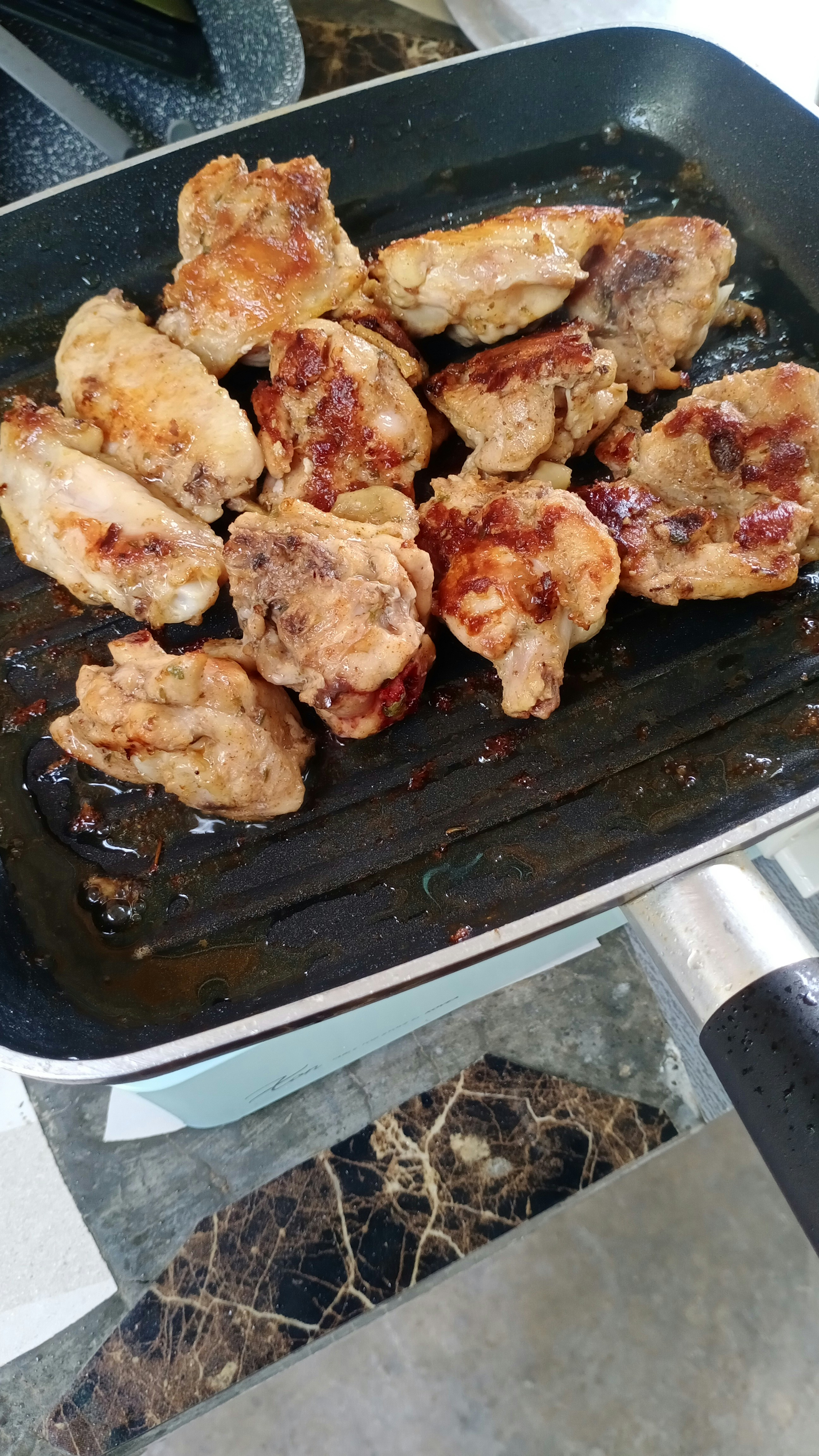 Crispy golden chicken wings on a plate