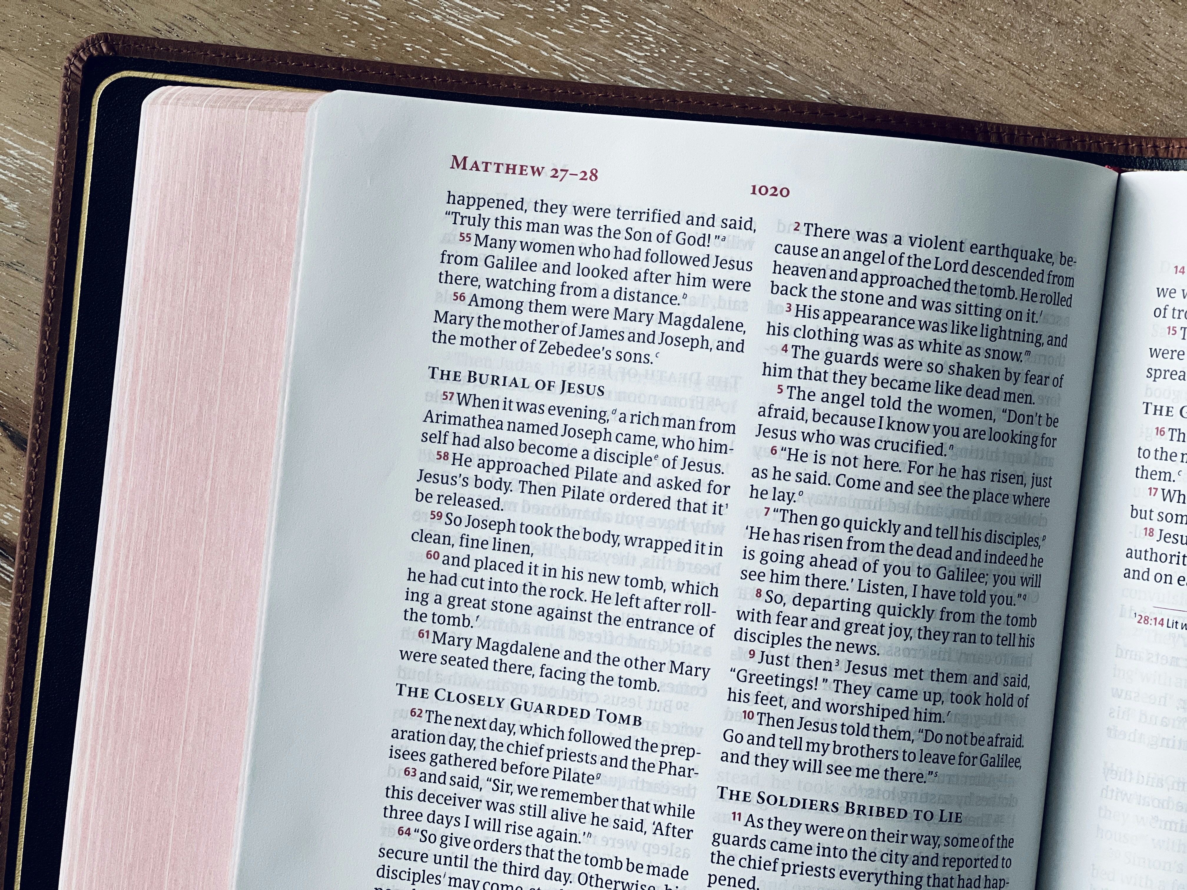 an open book on a wooden table