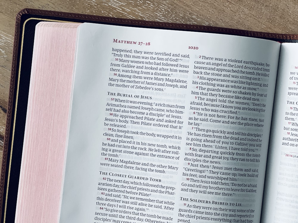 an open book on a wooden table