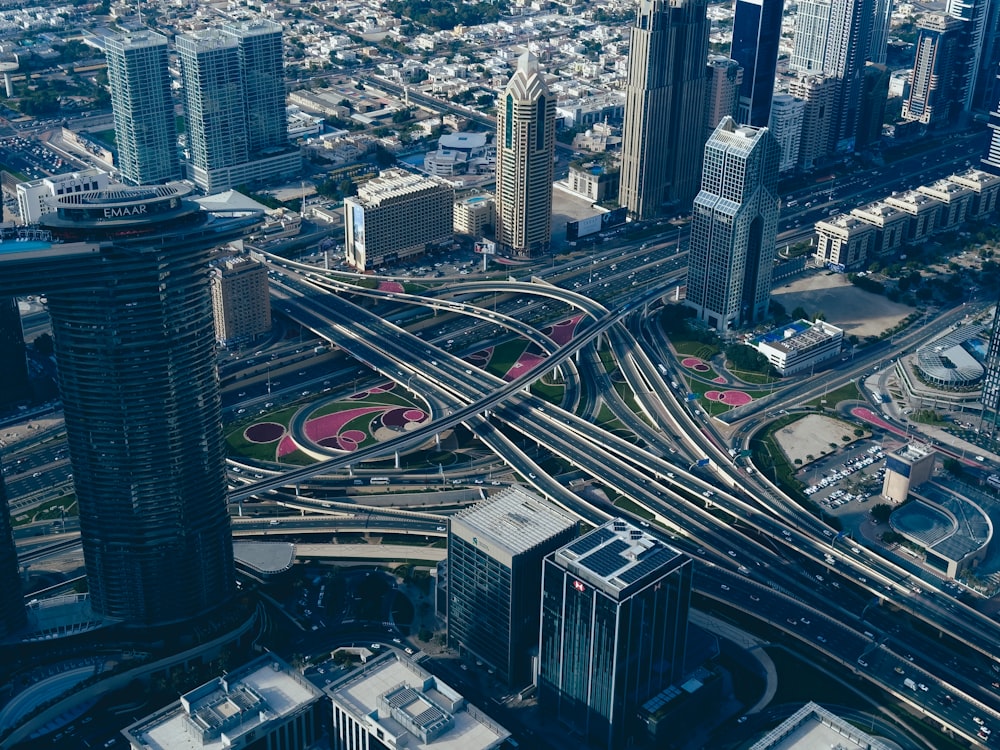 an aerial view of a highway intersection in a city