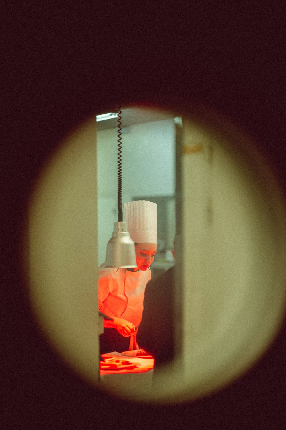 a view of a kitchen through a magnifying glass