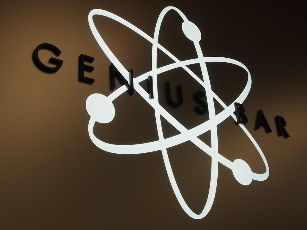 a neon sign that says genius bar on it