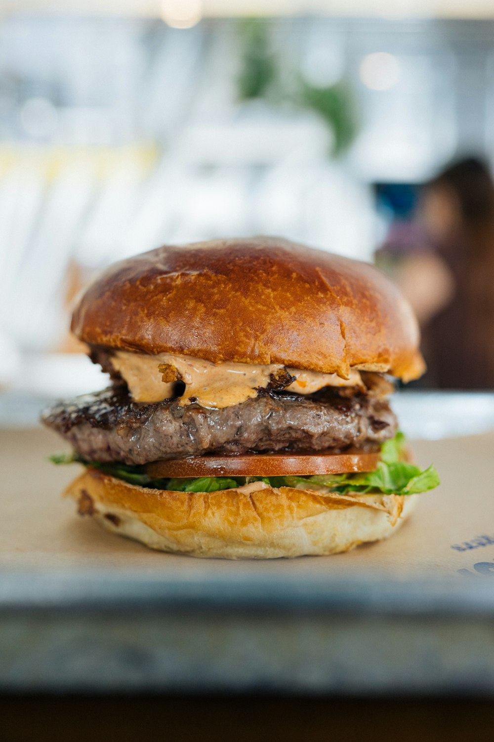 a hamburger sitting on top of a table