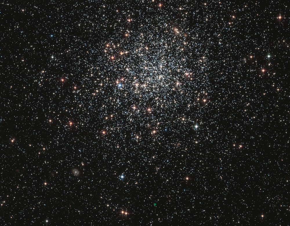 a cluster of stars in the night sky