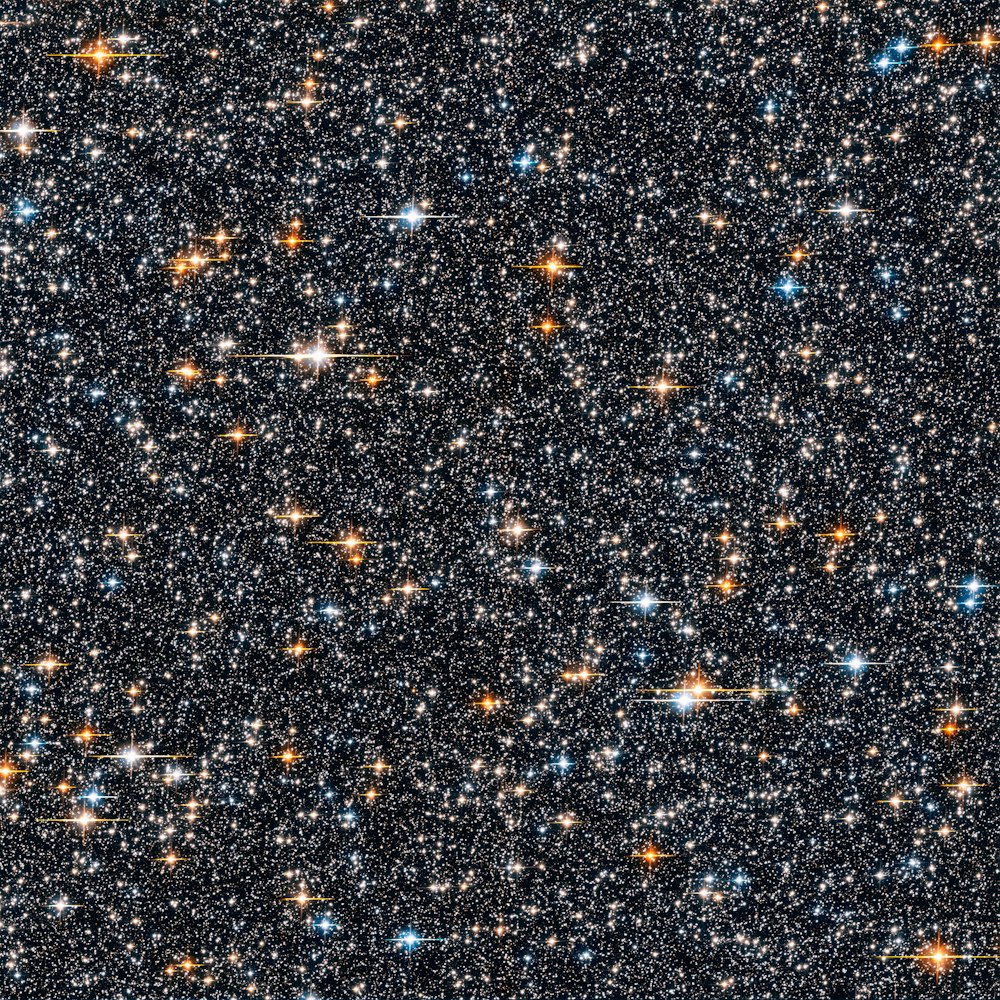 a cluster of stars in the night sky