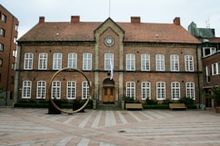a large building with a clock on the front of it