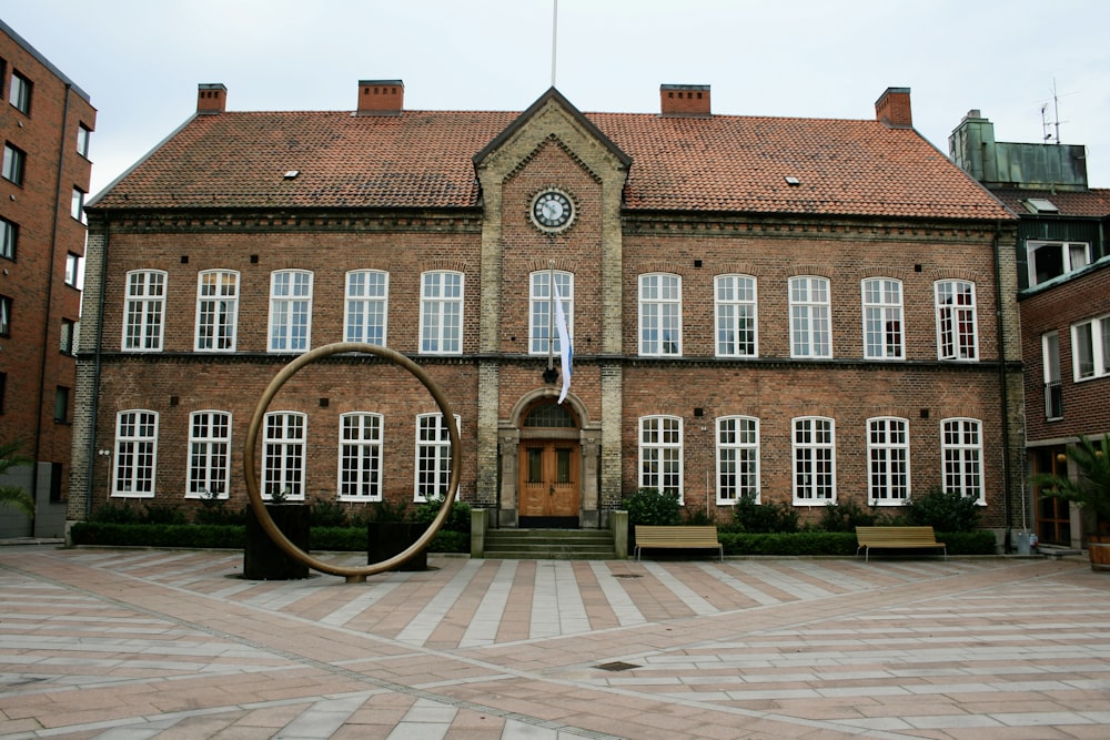 a large building with a clock on the front of it