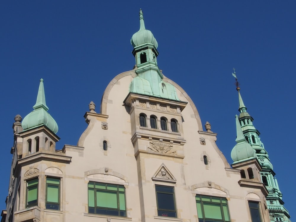 a large building with a clock on the top of it