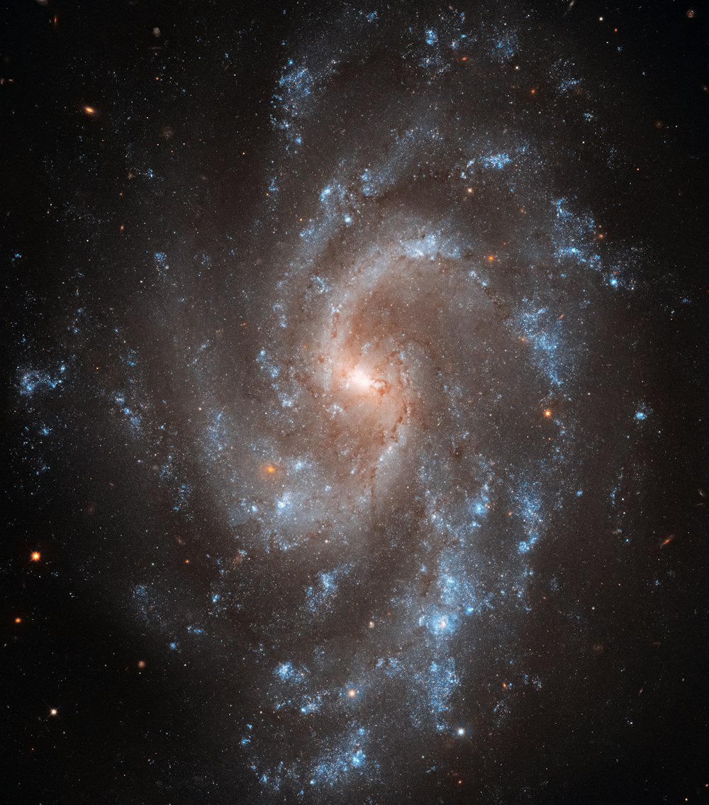 a spiral galaxy is shown in this image