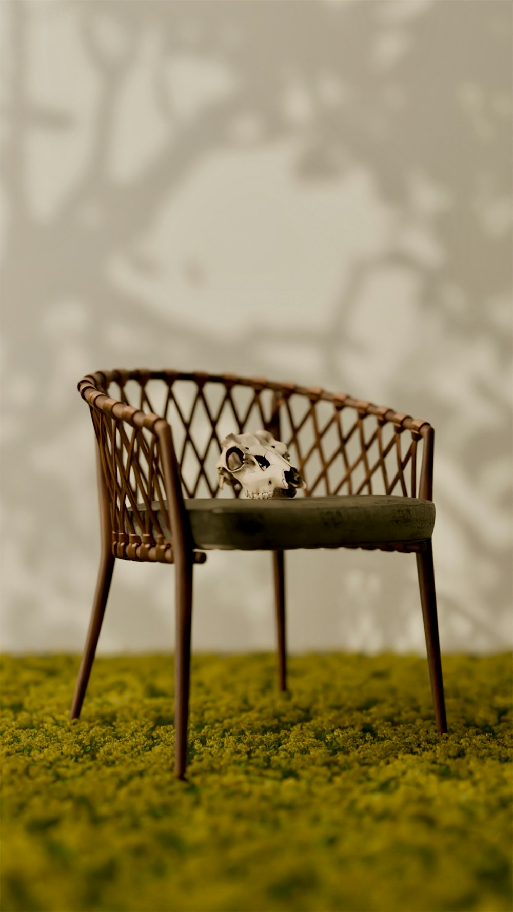 a miniature chair with a dog sleeping on top of it