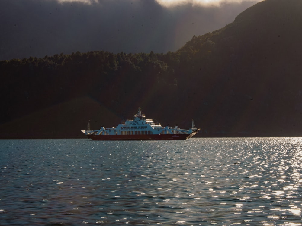 a large boat floating on top of a large body of water