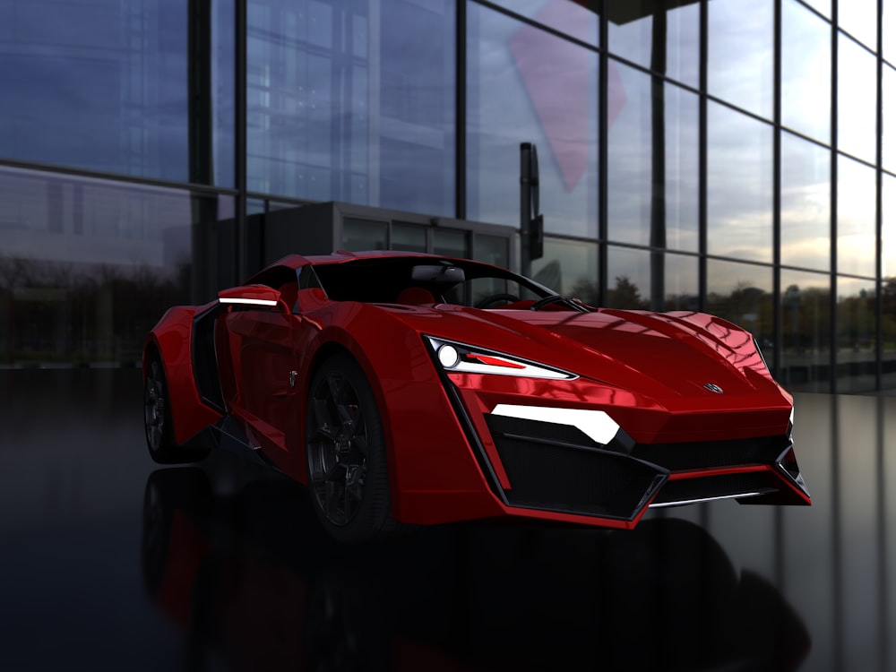 a red sports car parked in front of a building