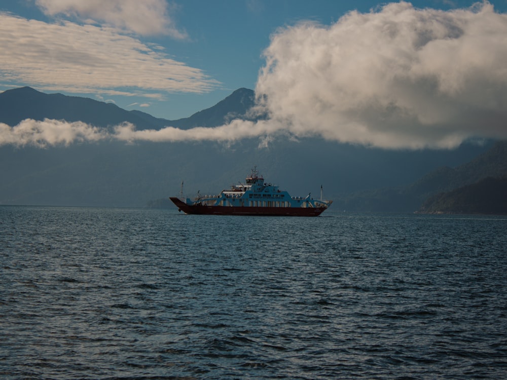 a large boat floating on top of a large body of water