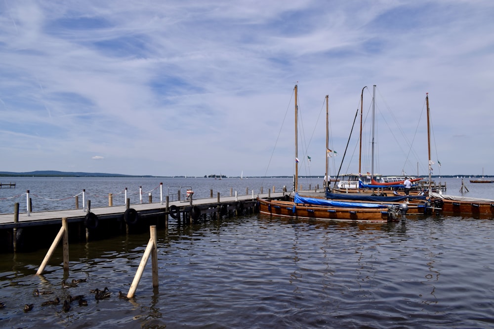 a couple of boats that are sitting in the water