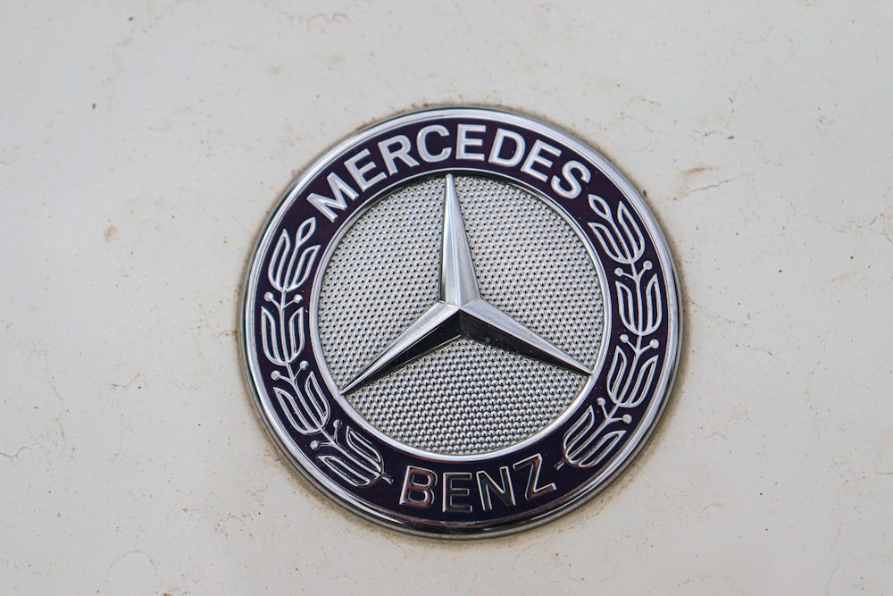 a mercedes emblem on the side of a car