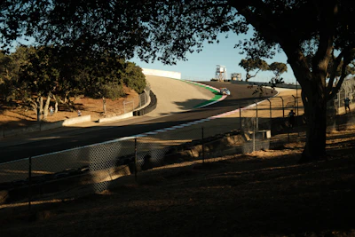 a person riding a motorcycle on a race track
