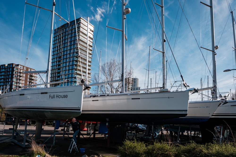 a group of sailboats parked next to each other