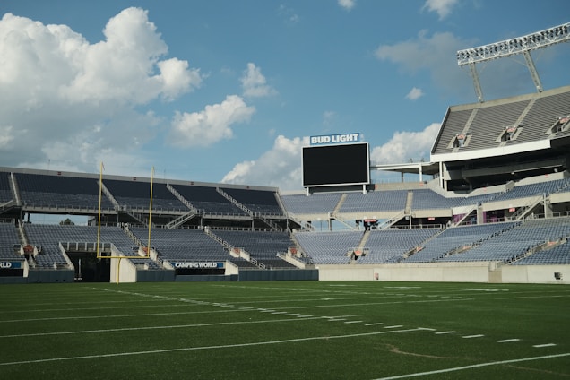 a view of a football stadium from the field