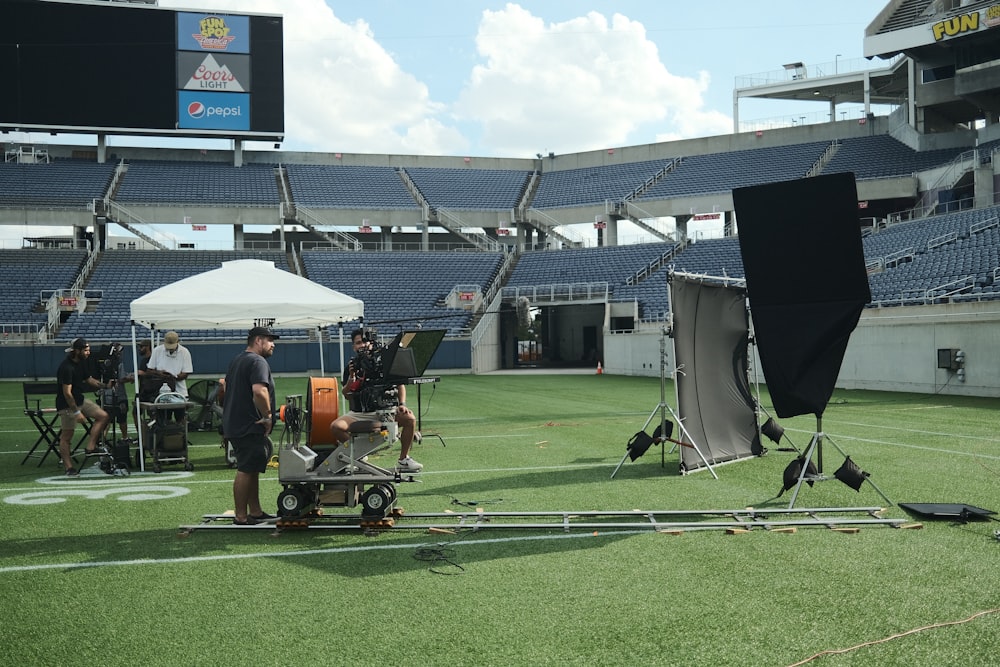 a camera set up on a football field