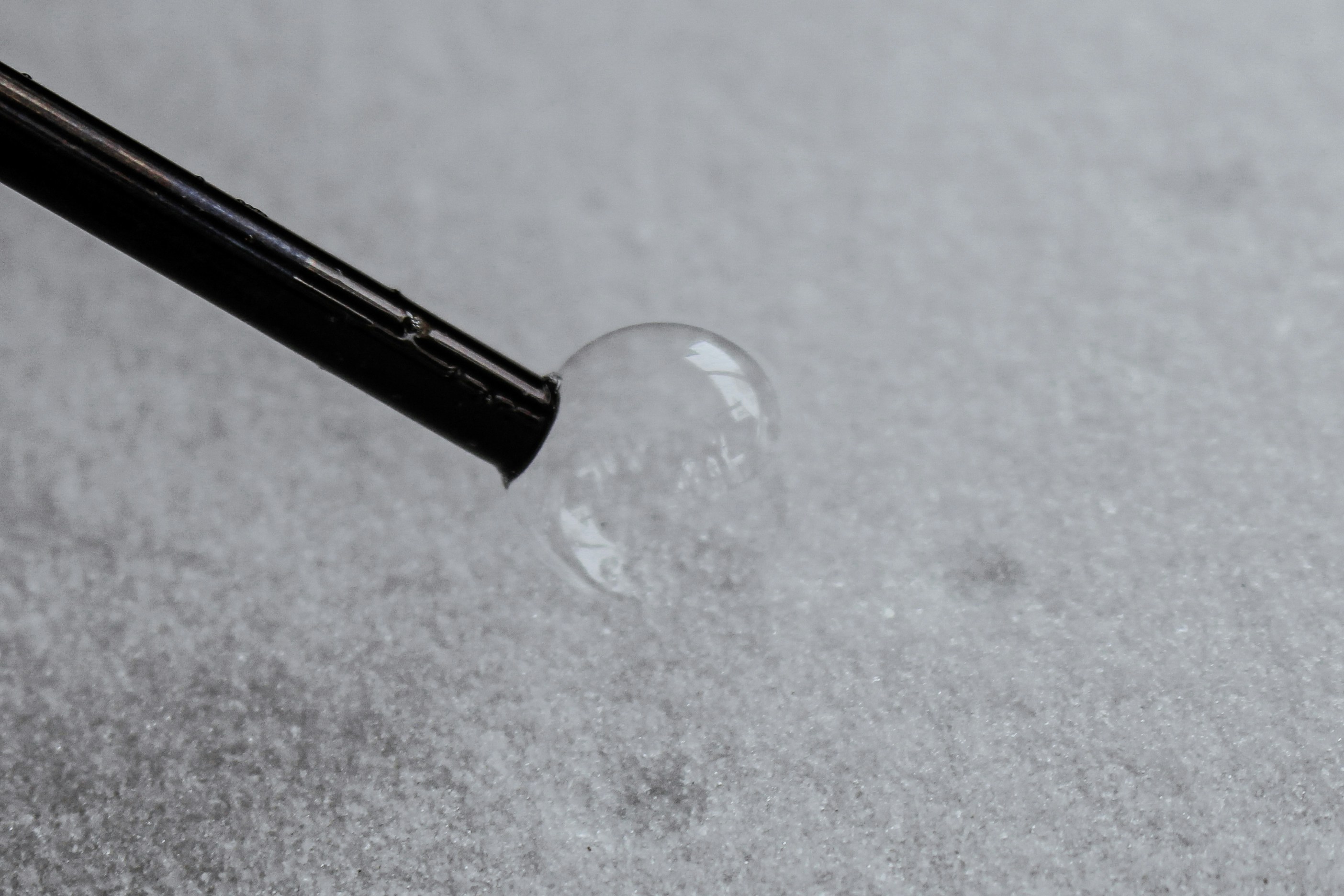 a close up of a pen on a table