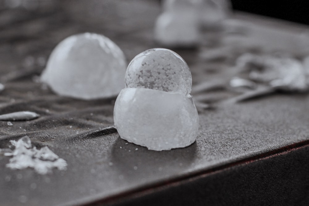 a couple of pieces of ice sitting on top of a table