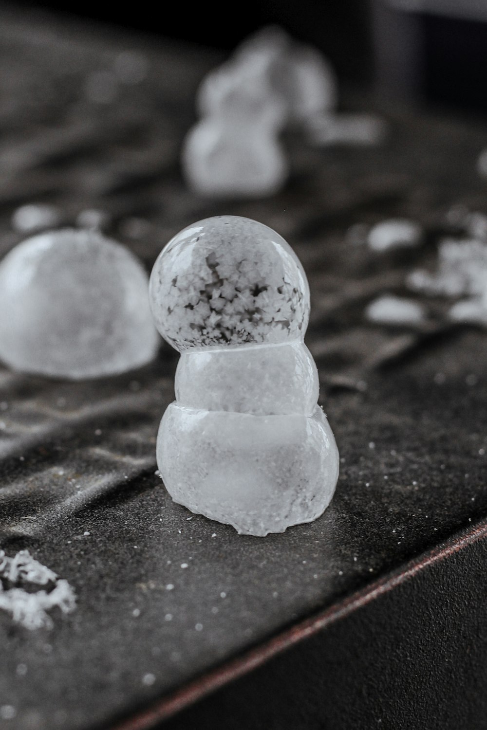 a pile of snowballs sitting on top of a table