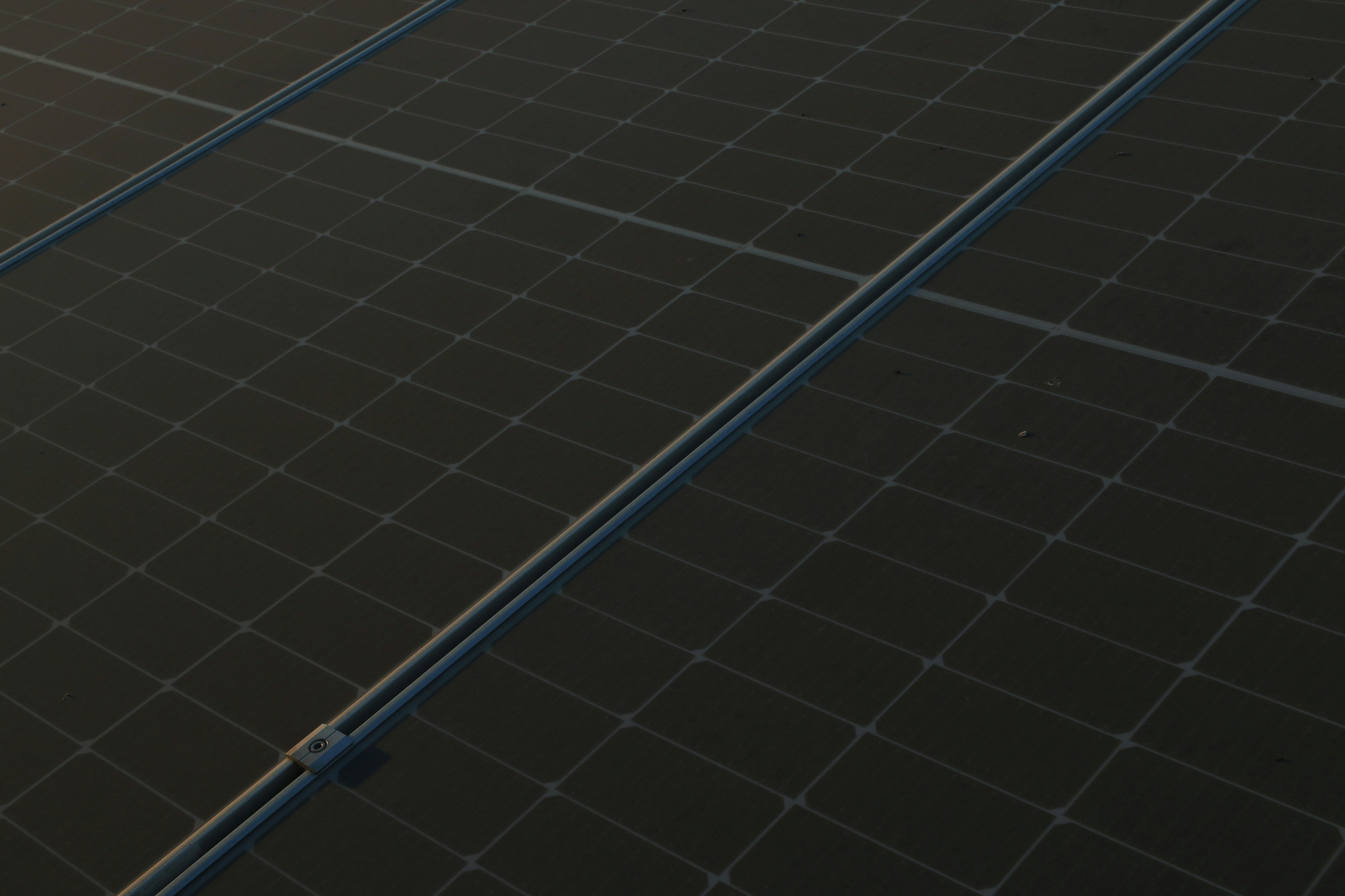 a close up of a solar panel with a sky background