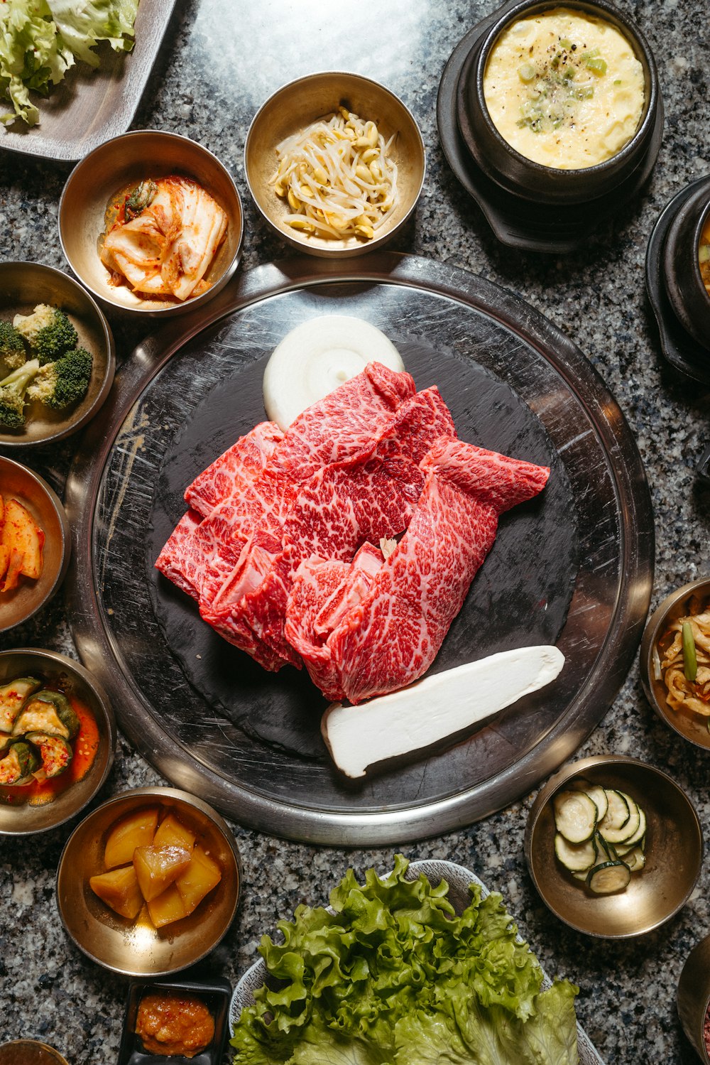 a table topped with lots of different types of food