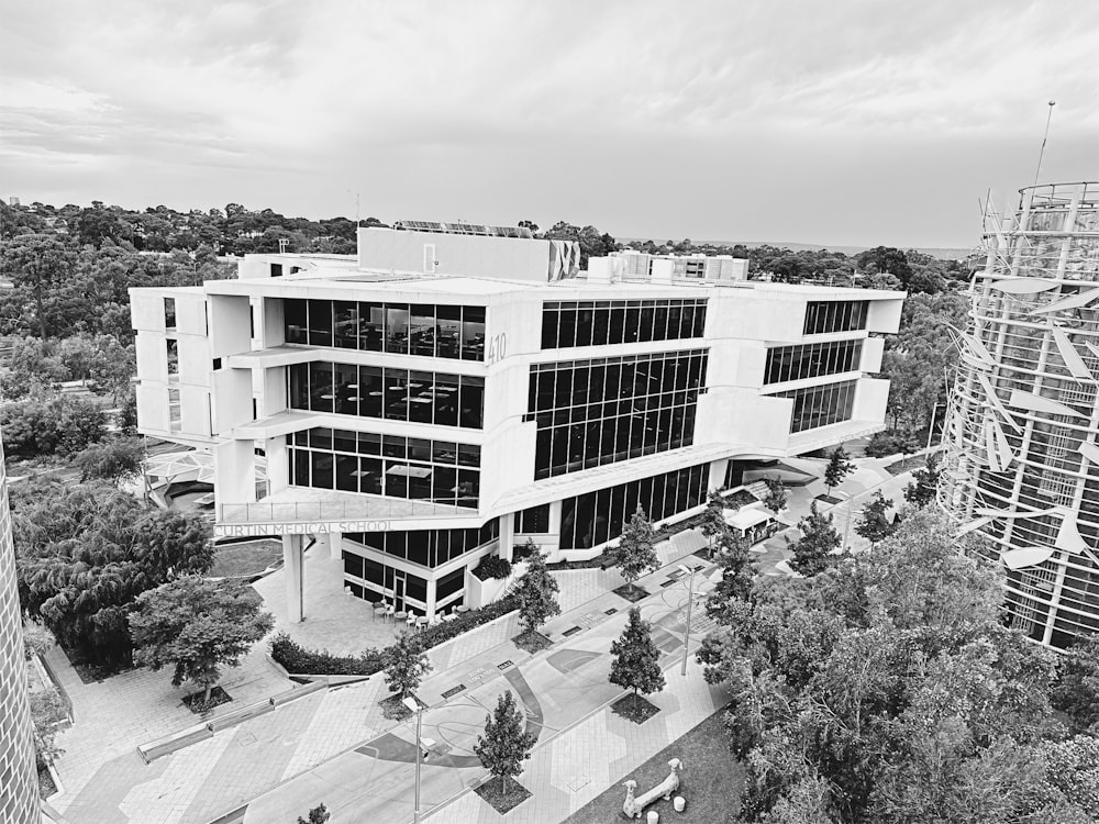 a black and white photo of a building with scaffolding around it