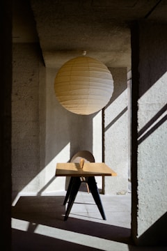 a table with a paper lantern on top of it