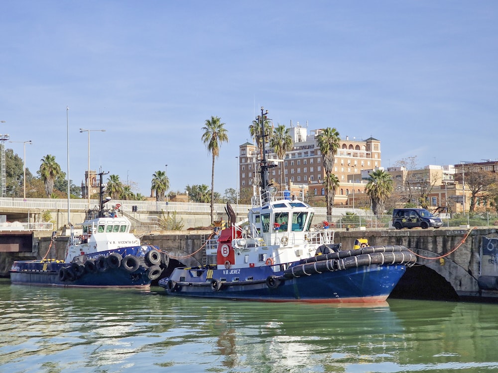 a couple of boats that are sitting in the water