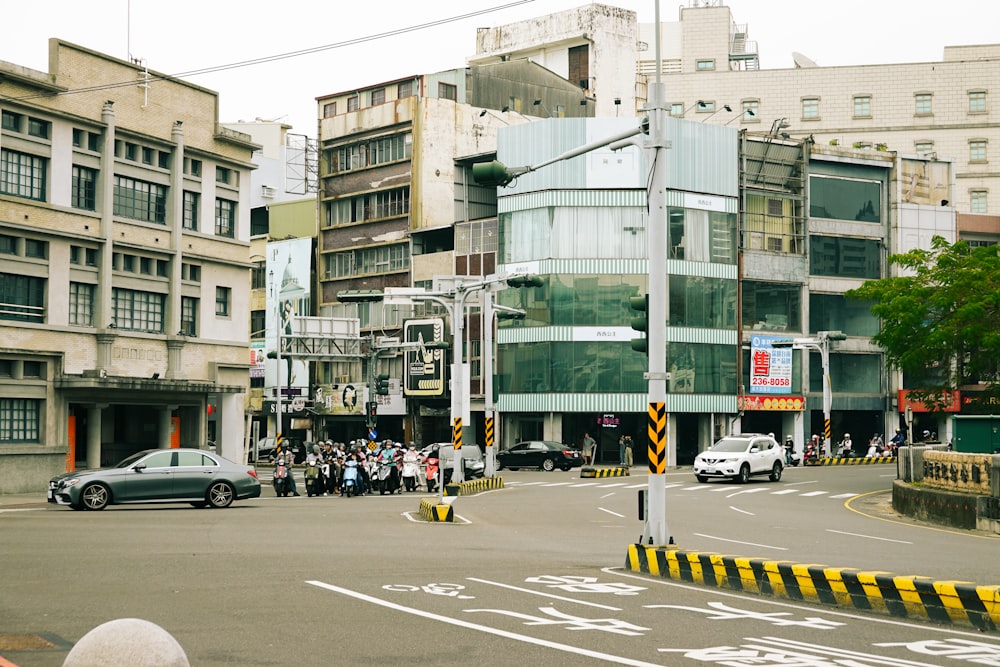 a busy city street with cars and pedestrians