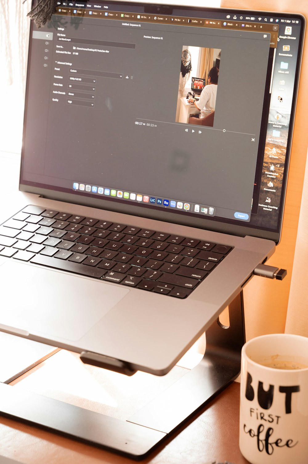 a laptop computer sitting on top of a wooden desk