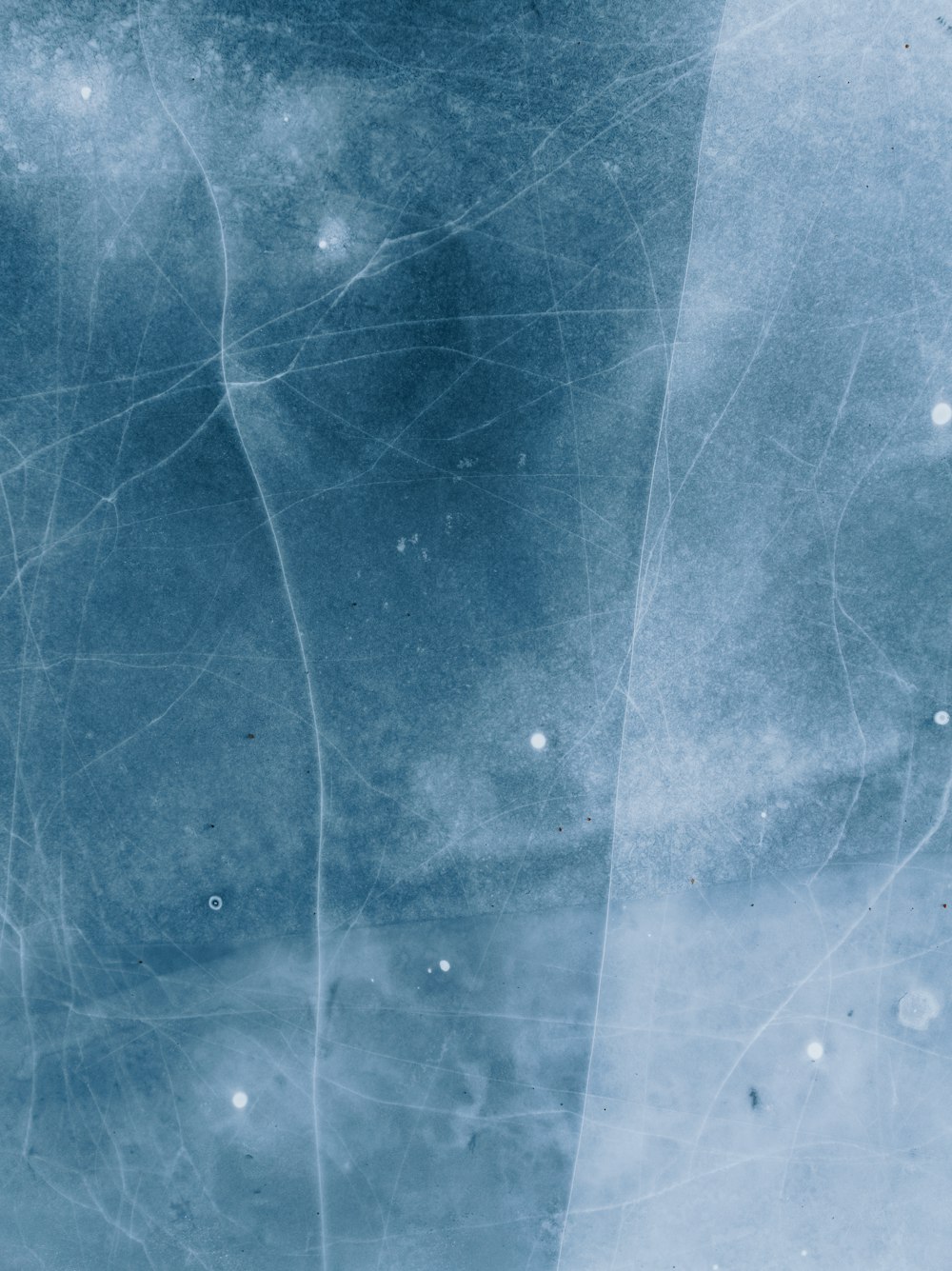 a close up of a piece of ice with snow flakes