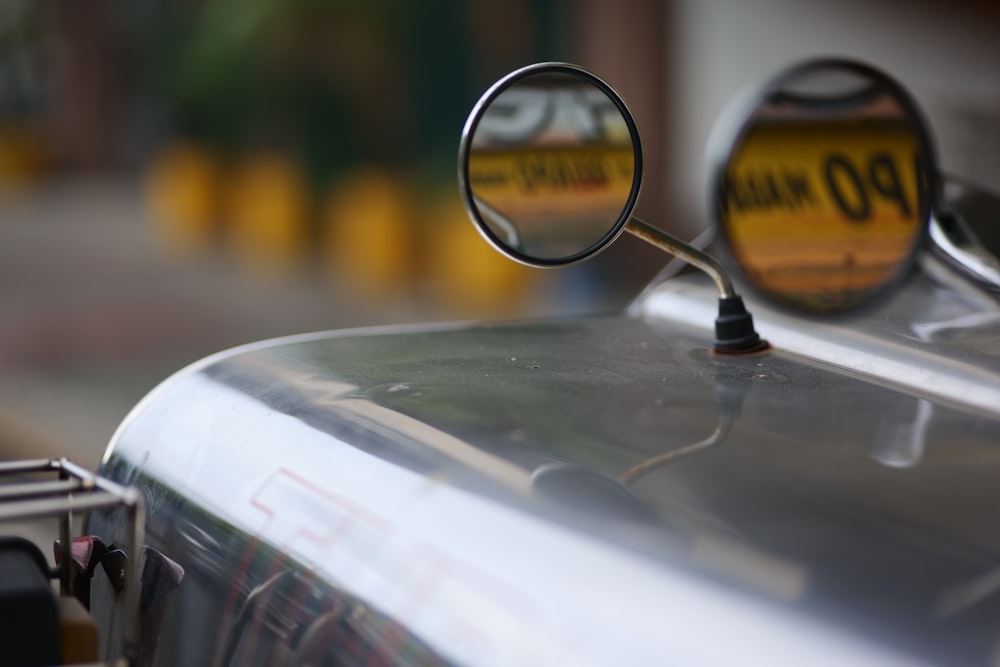 a close up of a mirror on a car