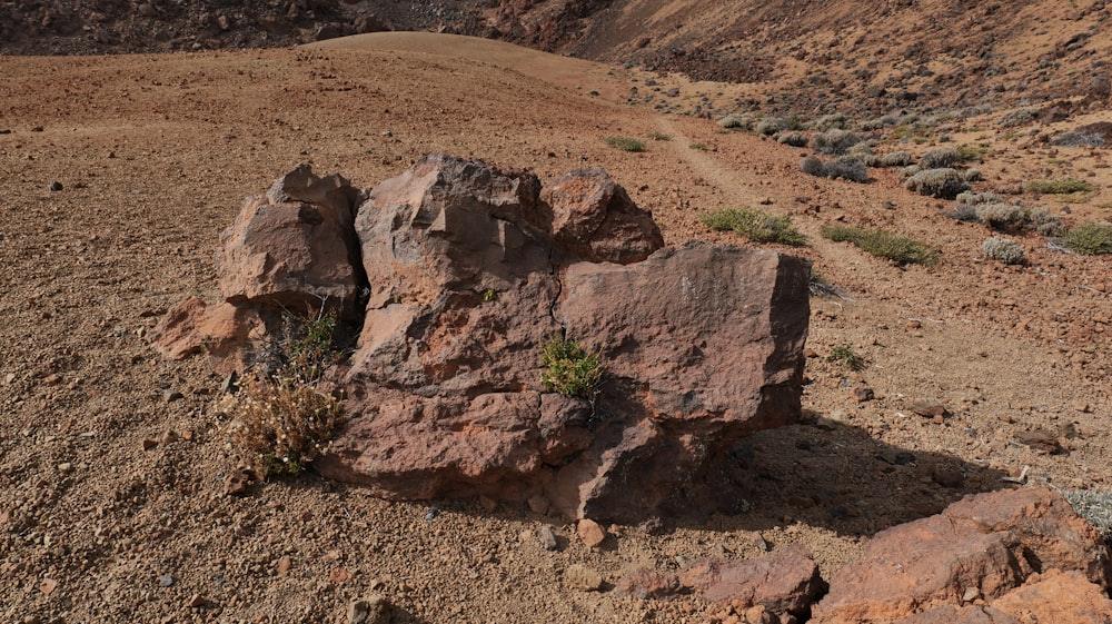 a rock formation in the middle of a desert