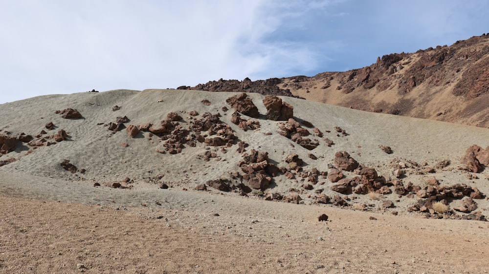 a large pile of rocks in the middle of a desert