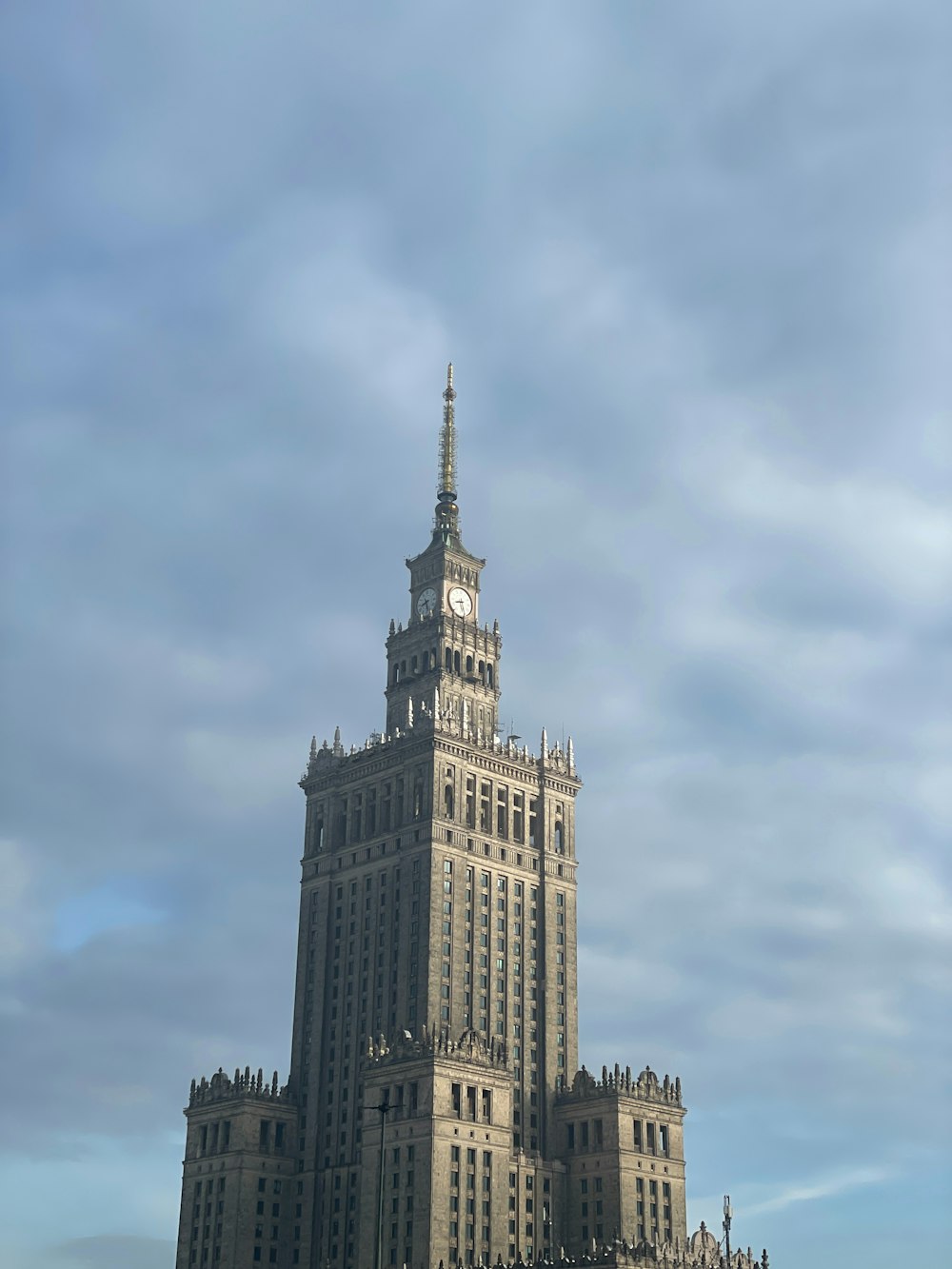 a large building with a clock on the top of it