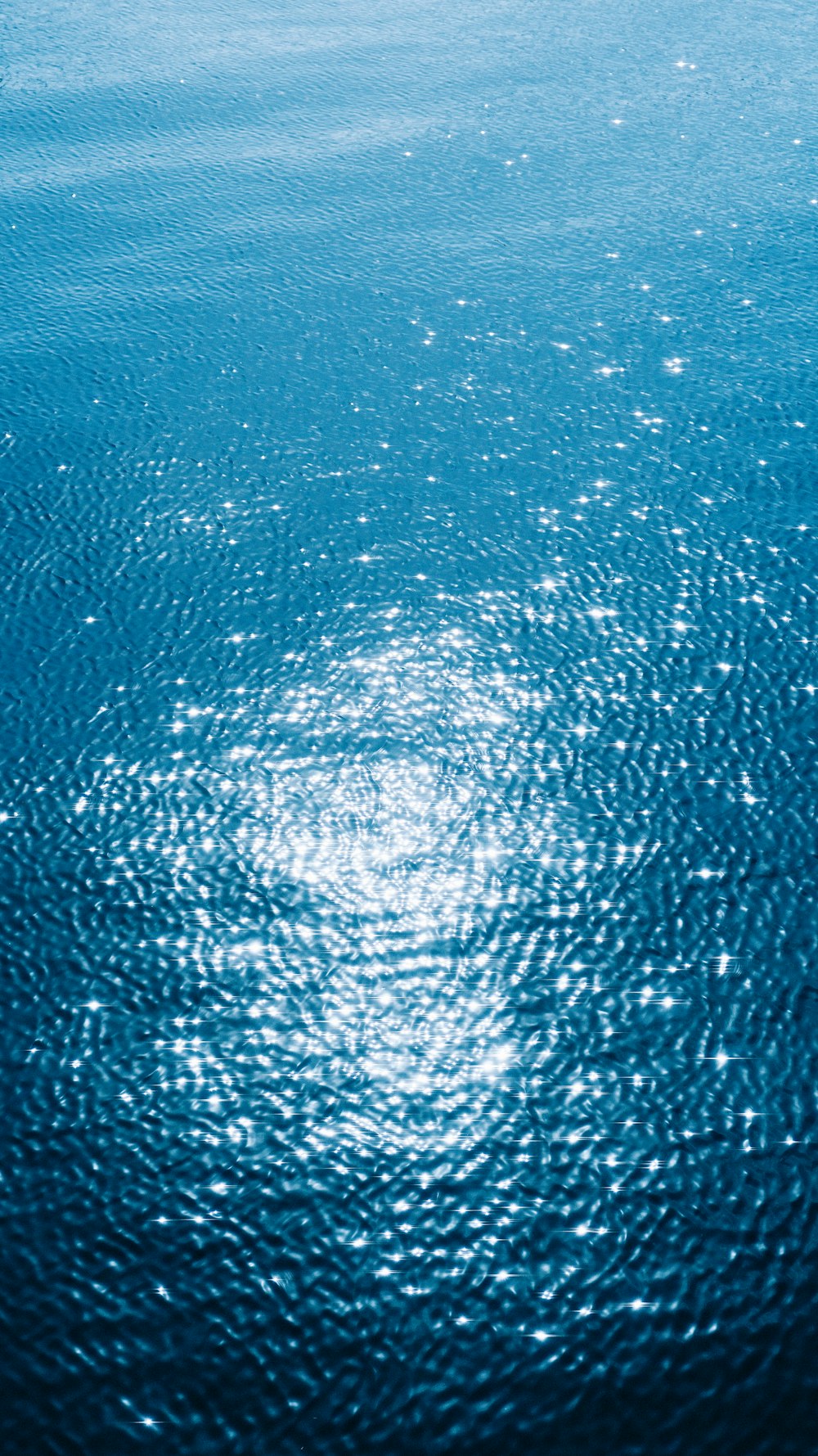 a boat floating on top of a large body of water