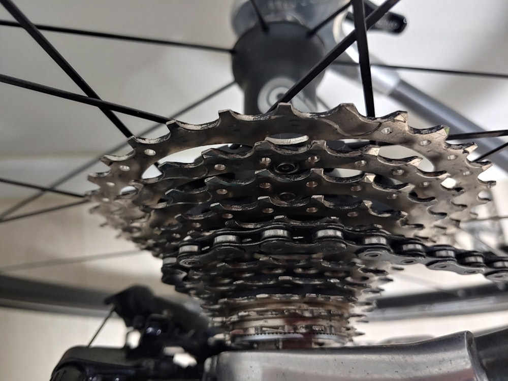 a close up of a bicycle's gear and chain