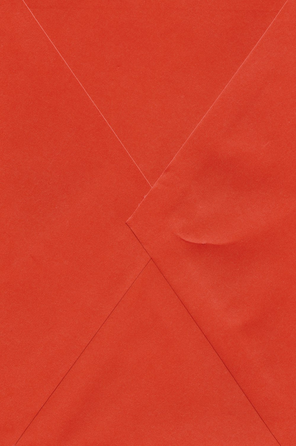 a piece of red paper folded in half