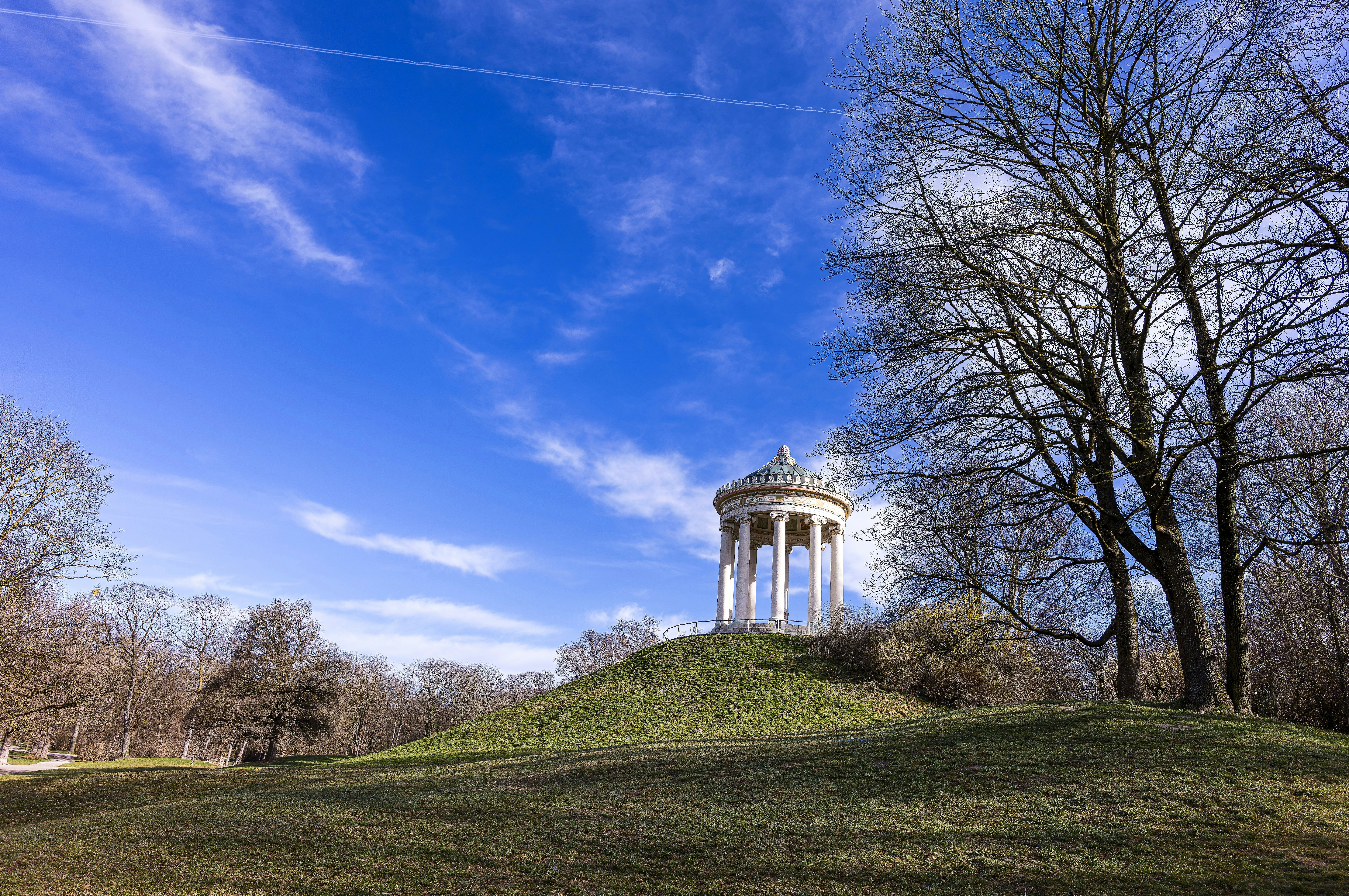 The Monopteros temple on its little hill in Munich's English Garden