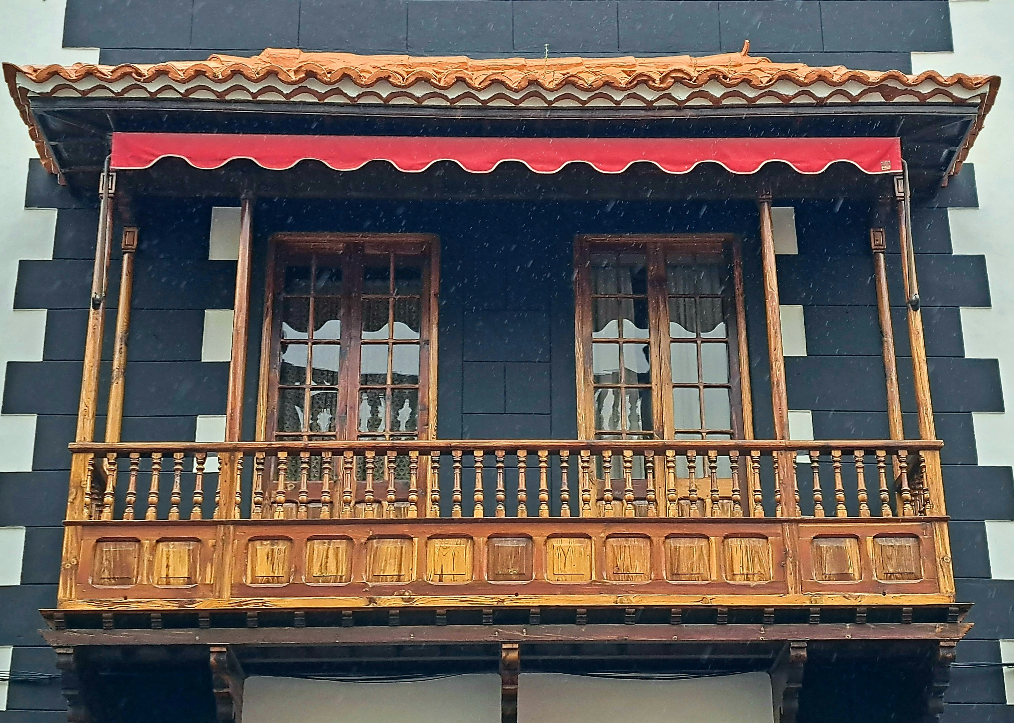 Traditional Javanese building with wooden balcony