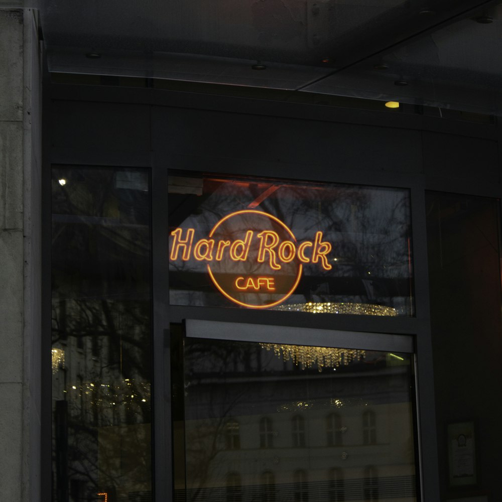a neon sign that reads hard rock cafe
