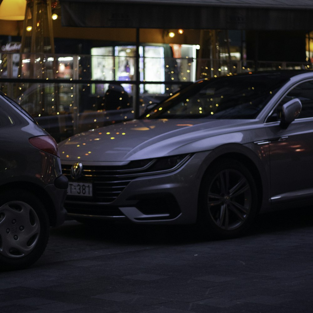 a couple of cars parked next to each other