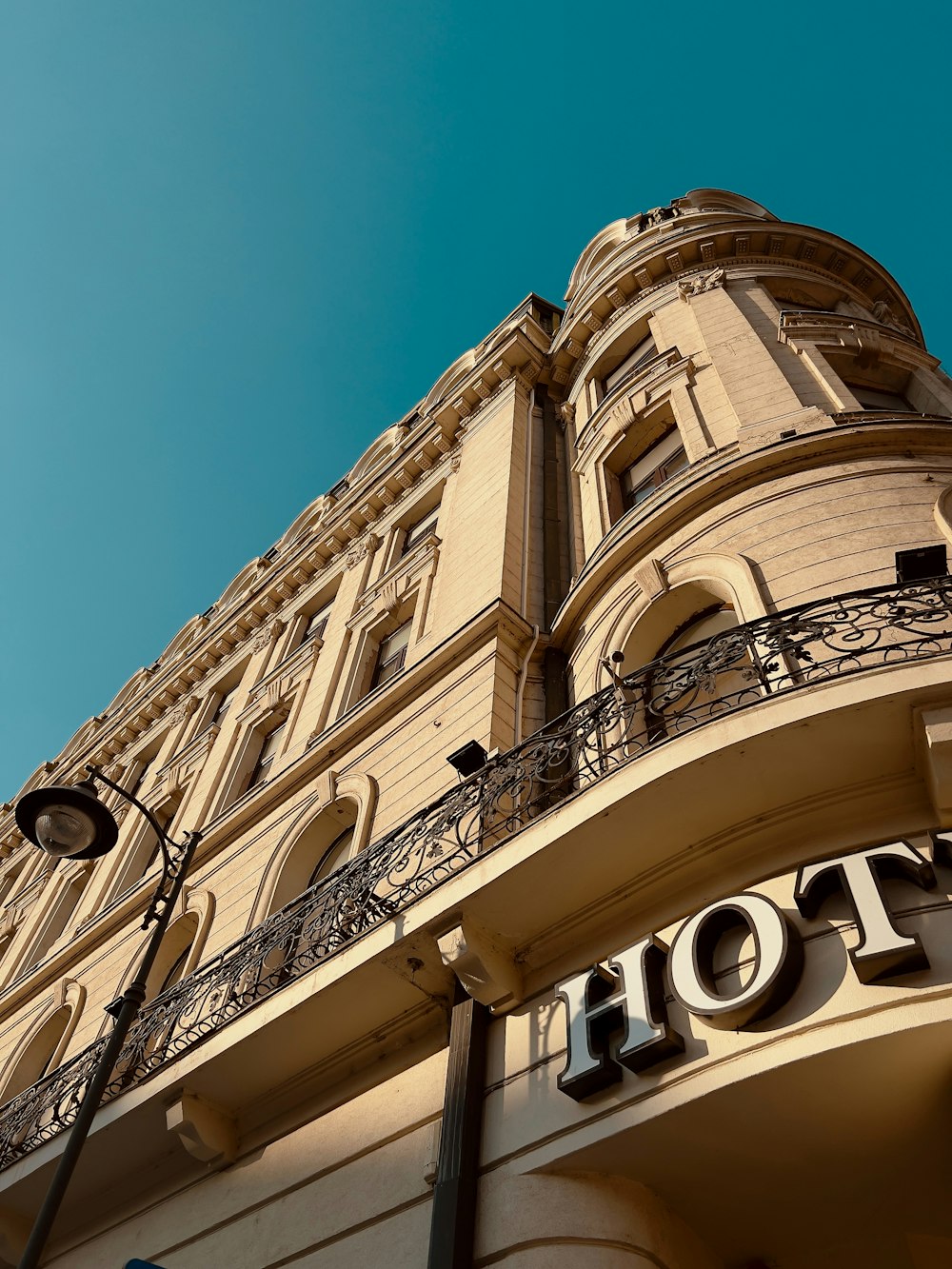 a tall building with a sign on the front of it